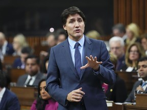 Prime Minister Justin Trudeau responds during question period in the House of Commons on Parliament Hill in Ottawa on Wednesday, Feb. 14, 2024. Trudeau is in Manitoba today where he is expected to sign a health care agreement with the province.