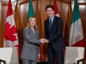 Canada's Prime Minister Justin Trudeau welcomes Italy's Prime Minister Giorgia Meloni in Toronto, Canada, on March 2, 2024. (Photo by CARLOS OSORIO / POOL / AFP)