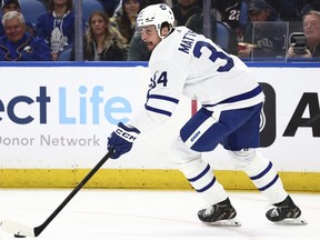 Maple Leafs centre Auston Matthews carries the puck up ice during first period NHL action against the Sabres in Buffalo, Saturday, March 30, 2024.