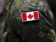 A Canadian soldier takes part in an announcement at Garrison Petawawa in Petawawa, Ont., Thursday, Oct. 19, 2023.