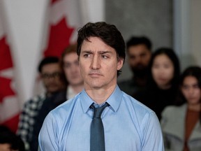 Prime Minister Justin Trudeau listens to a speaker during an announcement in Vancouver, Wednesday, March 27, 2024.