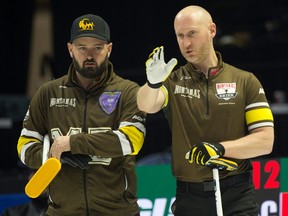 Team Manitoba's Reid Carruthers and Brad Jacobs