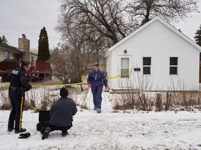 A doctor has determined a Manitoba man accused of killing five family members, including his three young children, is mentally fit to stand trial. RCMP and forensic investigators are shown on the scene of the investigation in Carman, Man., Monday, Feb. 12, 2024.