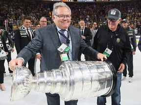 Las Vegas Golden Knights GM Kelly McCrimmon holds the Stanley Cup after his team’s five-game series victory in the final last June.
