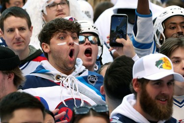 Fans celebrate during the Winnipeg Jets Whiteout Street Party