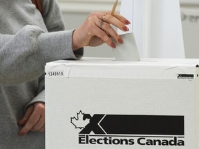 If one thing from the foreign interference inquiry is clear, it's that China attempted to meddle in the 2019 and 2021 elections. A voter casts their ballot in advance polls in Chambly, Que., Friday, Sept. 10, 2021.