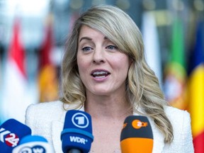 Canadian Foreign Minister Melanie Joly speaks to the press after her arrival at NATO headquarters on the first day of the NATO Foreign Ministers' Meeting on April 3, 2024 in Brussels, Belgium.