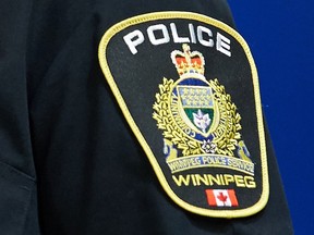A Winnipeg Police Service shoulder badge is seen at a press conference in Winnipeg on Sept. 2, 2021.