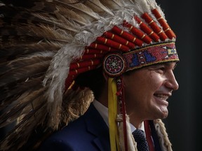 Manitoba Premier Wab Kinew speaks at a premier and cabinet swearing-in ceremony in Winnipeg, Wednesday, Oct. 18, 2023. New figures show Manitoba New Democrats raised and spent more money than the Progressive Conservatives in last year's election campaign.