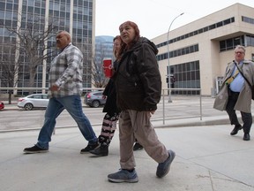 Donna Bartlett (centre), the grandmother of Marcedes Myran, walks to the Court of King's Bench of Manitoba building in downtown Winnipeg, where the trial of Jeremy Skibicki, the man accused of killing Myran and three other Indigenous women is set to begin, on Monday, April 29, 2024.