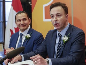 Manitoba Premier Wab Kinew and Finance Minister Adrien Sala