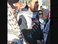 This image from an X posting from Conservative MP Melissa Lantsman shows a protester in Toronto marching in an Al Quds Day parade with a replica suicide vest. (https://twitter.com/MelissaLantsman/status/1776752834857382281/photo/1)