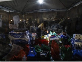 Pro-Palestinian demonstrators prepare supplies at an encampment on the University of Toronto campus on May 2, 2024, in Toronto, Canada. Dozens of universities in the United States have also seen pro-Palestinian demonstrations in recent weeks, leading to clashes with police and counter-protests.