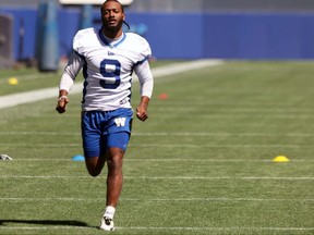 Receiver K.J. Hill does a wind sprint