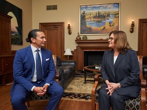 Manitoba Premier Wab Kinew is not saying when he will call a byelection in a Winnipeg constituency previously held by former premier Heather Stefanson, but interest appears to be growing already. Kinew, left, meets with Stefanson in the Premier's office in Winnipeg, Thursday, Oct. 5, 2023.