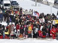 Family and supporters walk from Portage and Main to the Manitoba legislature to protest the provincial government's delay in searching a landfill for missing indigenous women, Friday, March 8, 2024.