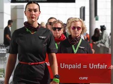 Air Canada flight attendants picketed at the Vancouver International Airport during a national day of action on Aug. 11, 2025.