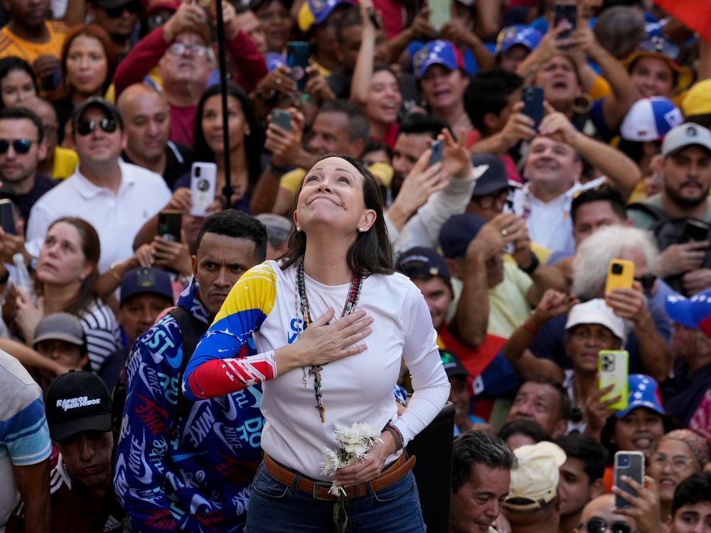 Supporters of Venezuelan opposition leader Maria Corina Machado march in cities worldwide